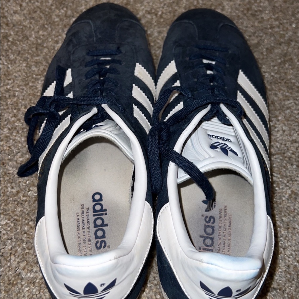 Lightly used Adidas Womens Superstar Size 10, box in very worn condition.